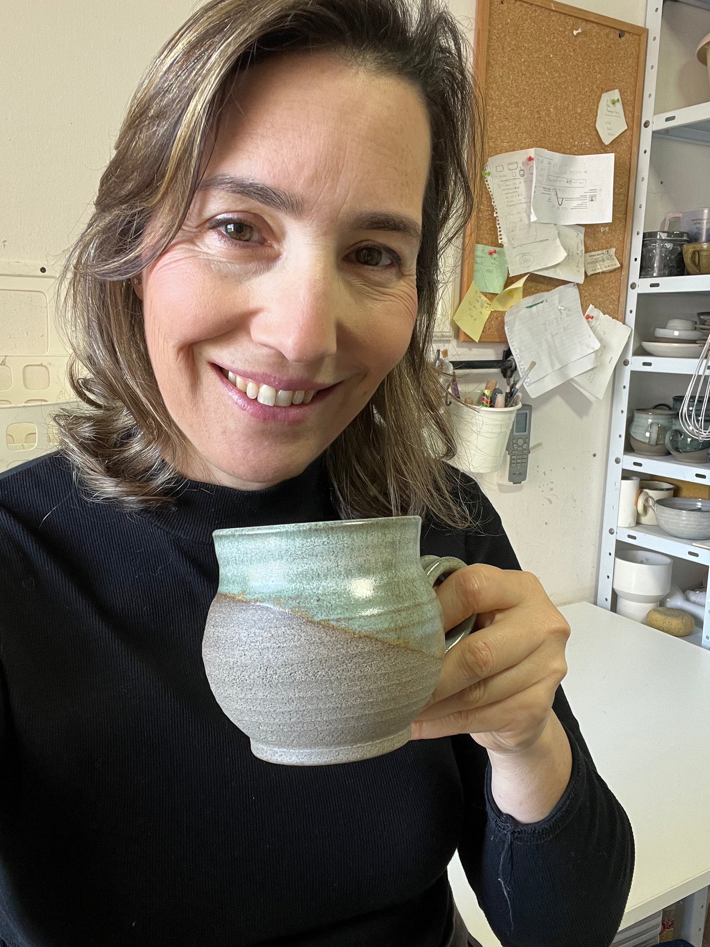 Ceramic mugs with matte and glossy glaze combination.