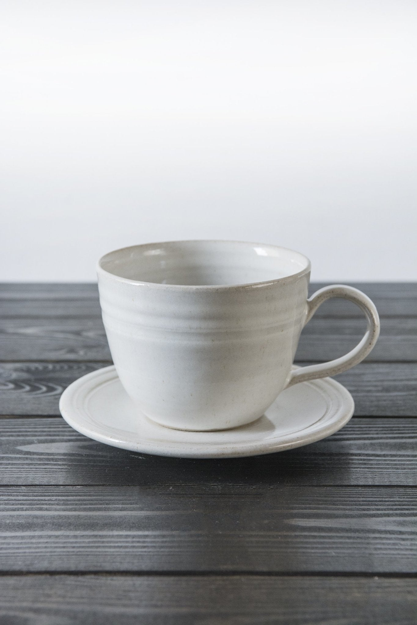 Pottery White Tea Cup and Saucer - RAMIREZ ZANOTTY- Mug